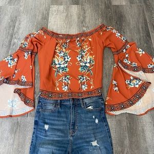 orange floral print off the shoulder top